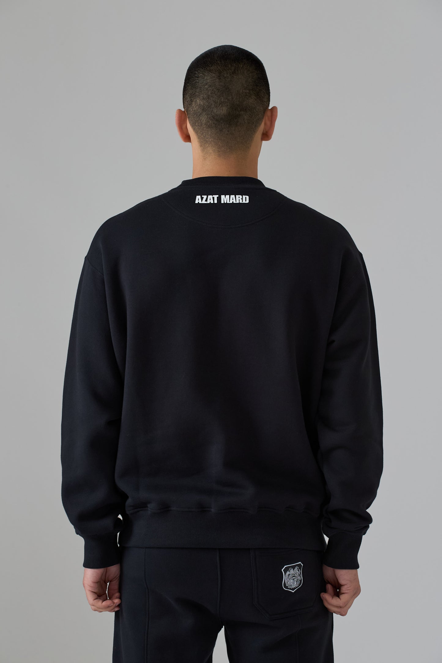 BLACK FRONT CREST SWEATER