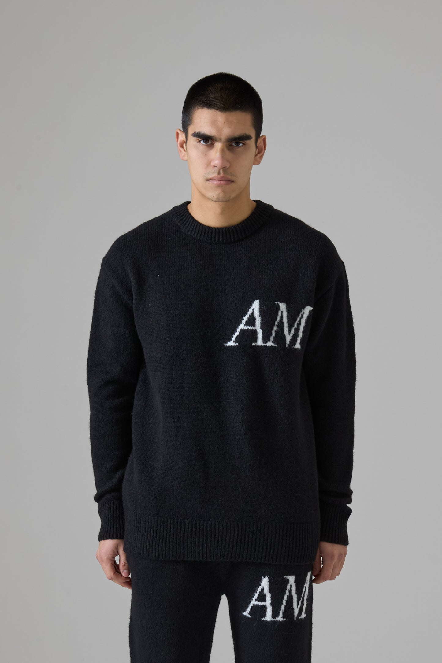 BLACK KNITWEAR SWEATER