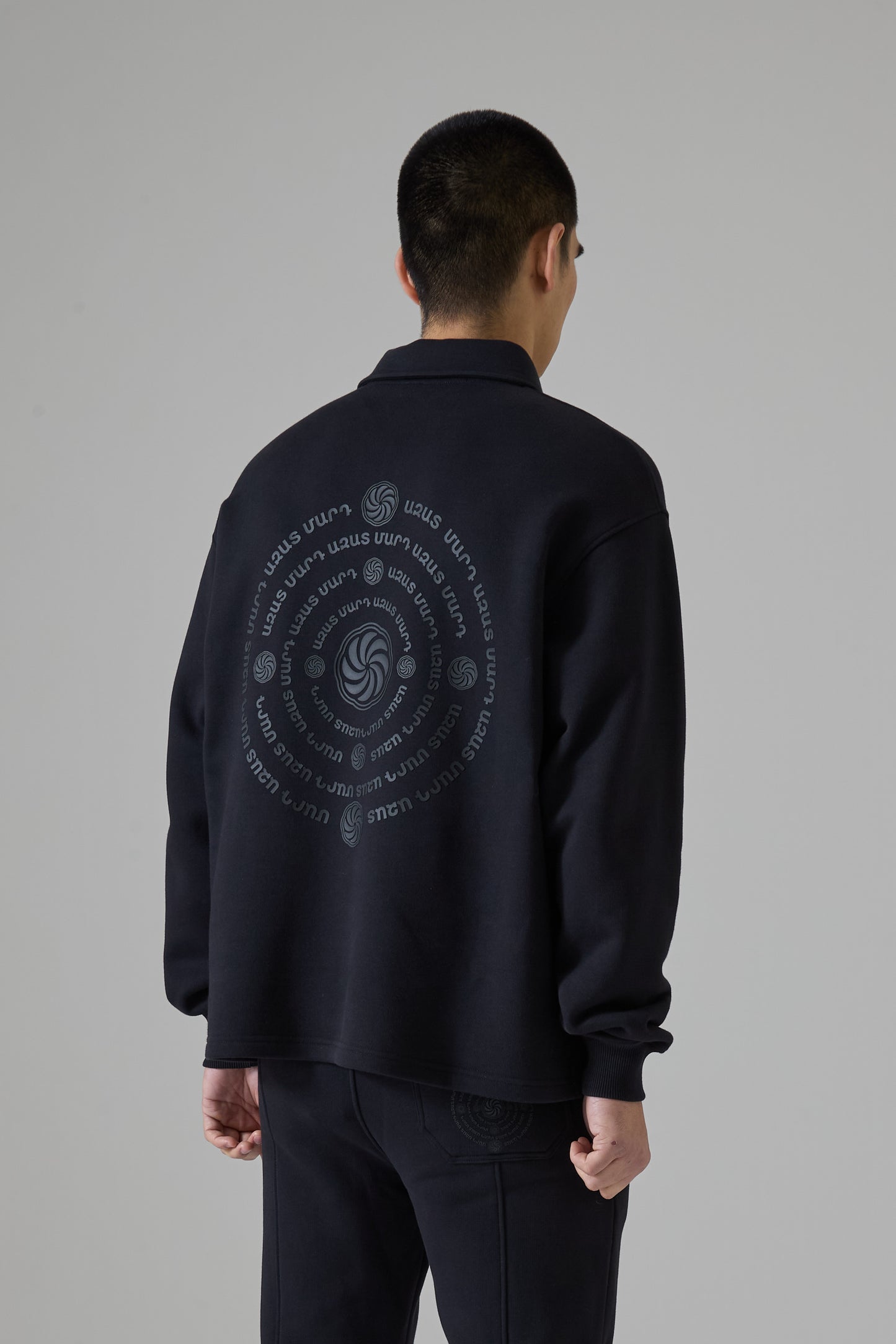 WHEEL OF ETERNITY BLACK QUARTER ZIP SWEATER