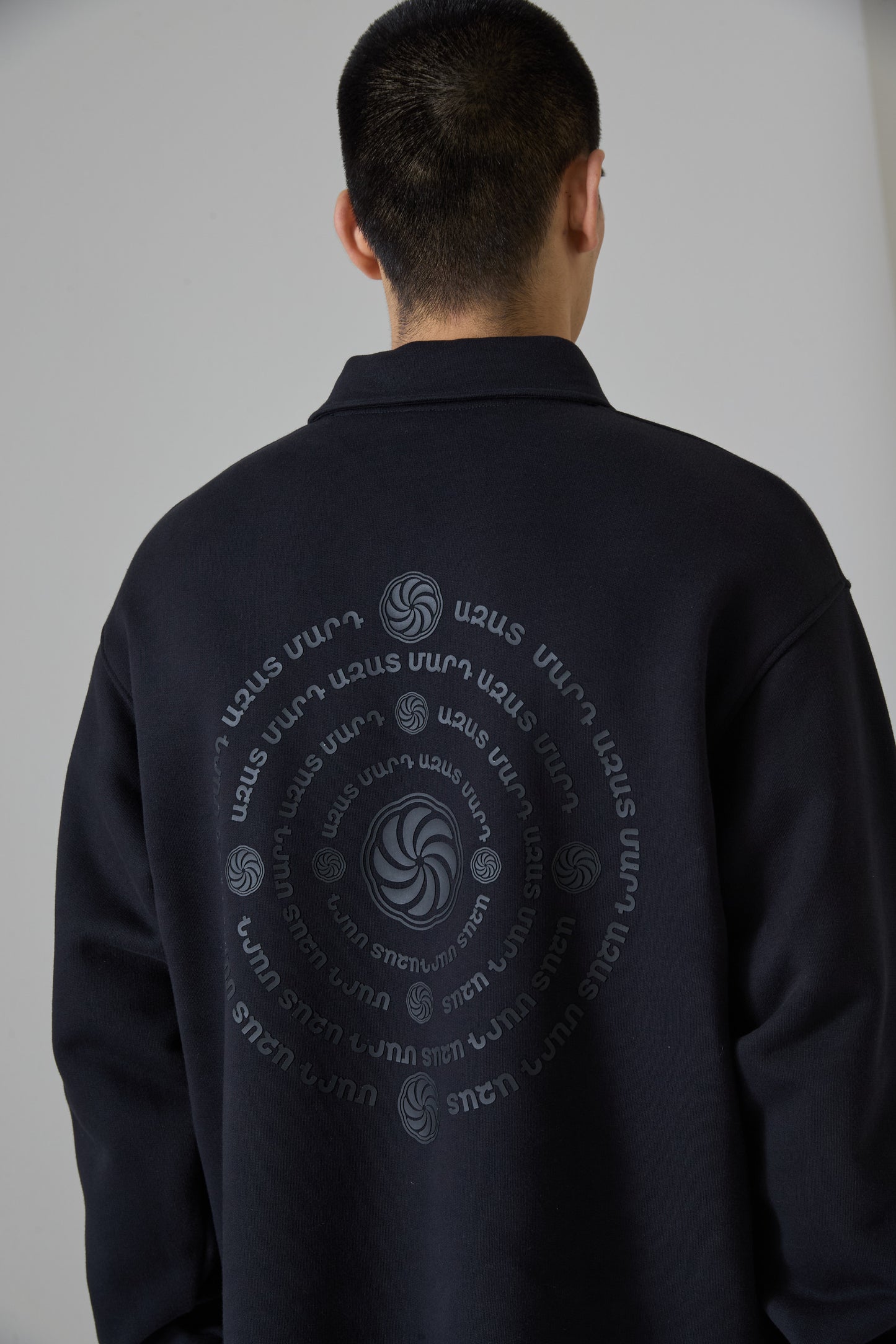 WHEEL OF ETERNITY BLACK QUARTER ZIP SWEATER