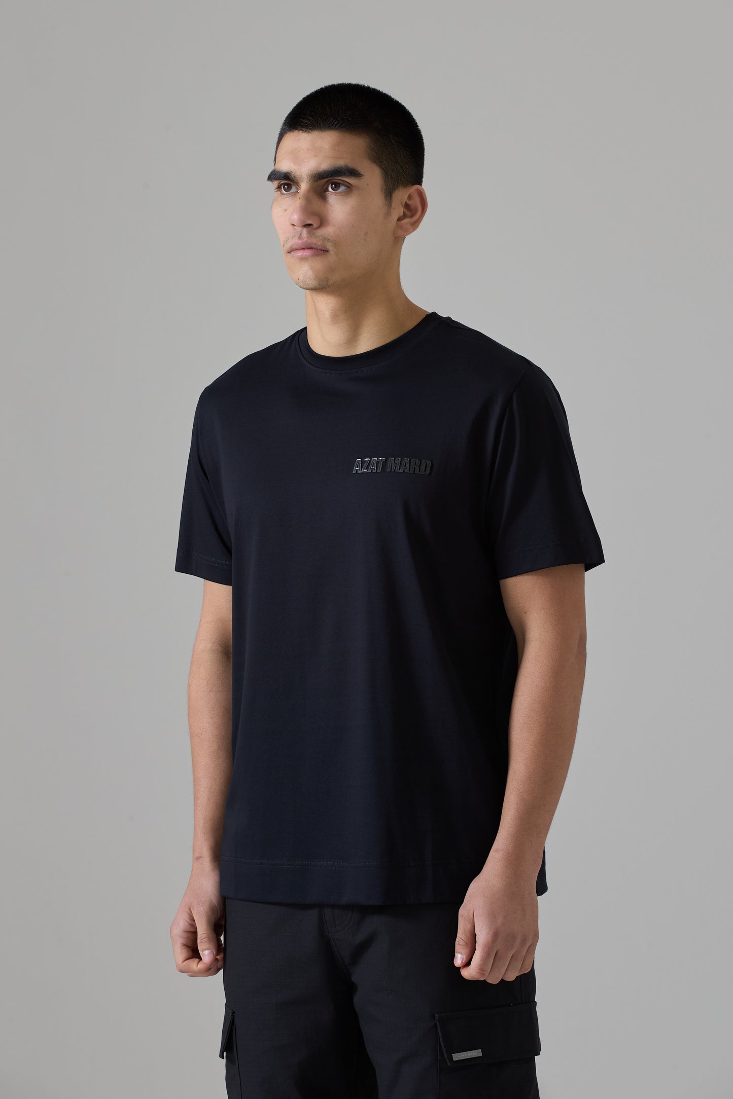 BLACK MERCERISED T-SHIRT WITH BLACK ORGANIC LEATHER LOGO