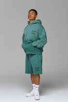 LES GENS WASHED GREEN SHORTS