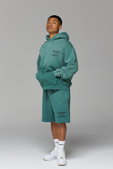 LES GENS WASHED GREEN SHORTS