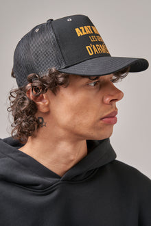 LES GENS BLACK/YELLOW TRUCKER CAP