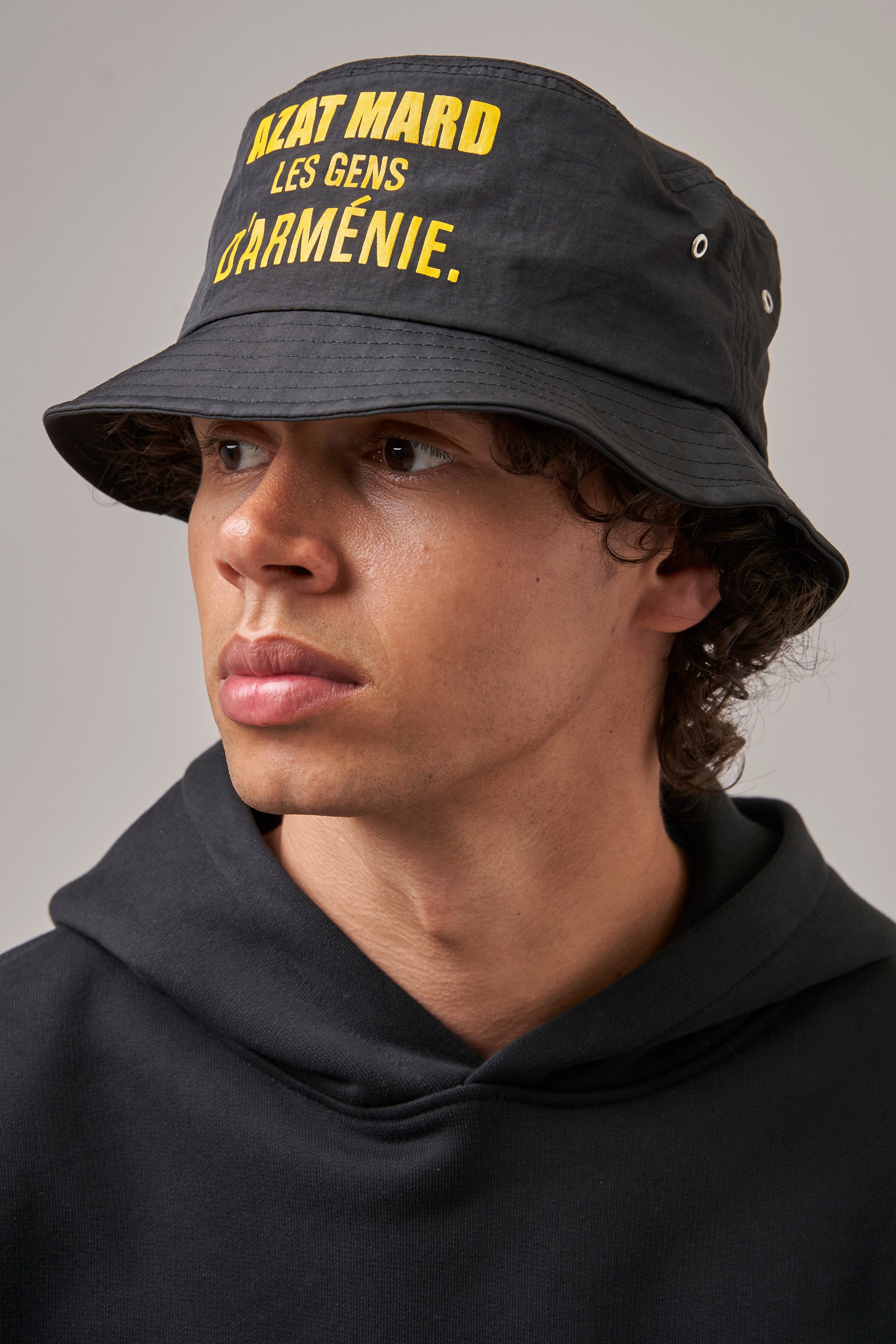 Yellow and store black bucket hat