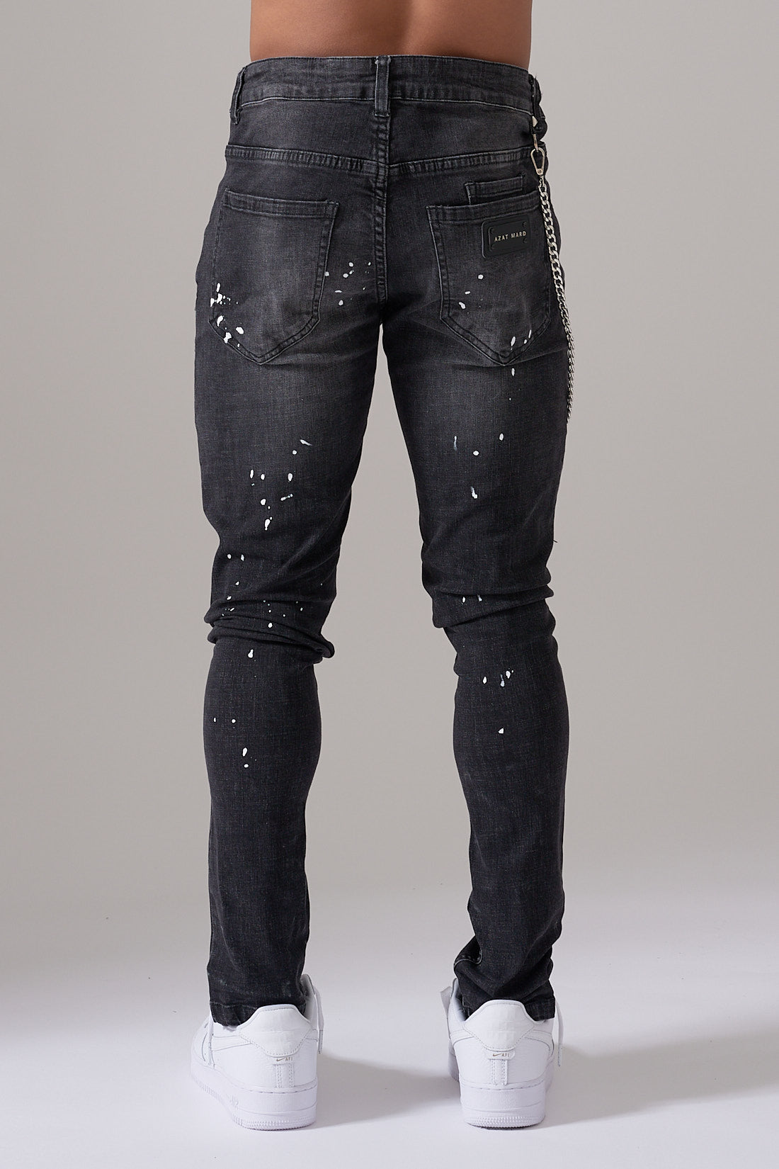 Men's paint splatter ripped sales jeans